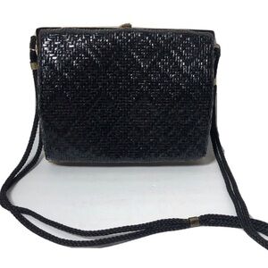 Vintage black jute snap closure bag.